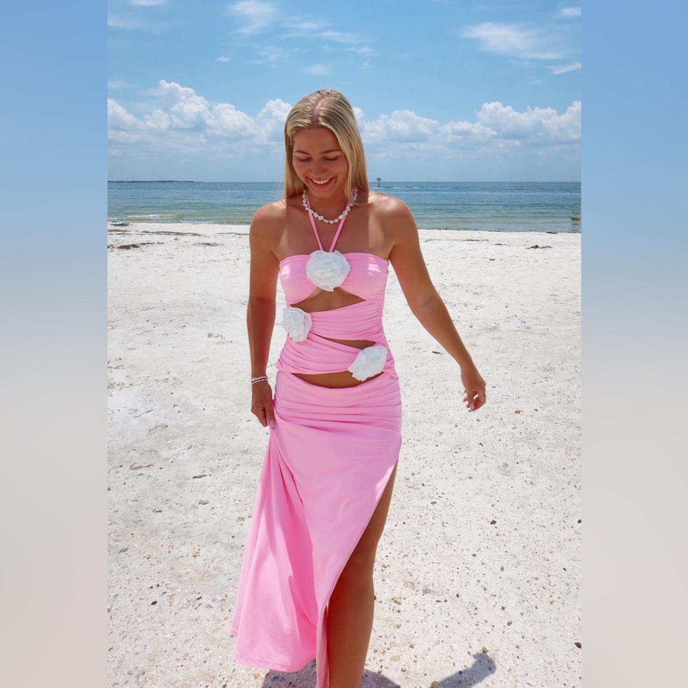 Pink halter maxi dress with cut outs and flowers